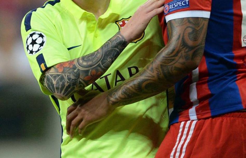 Il nuovo tatuaggio di Leo Messi (a sinistra): un omaggio alla Sagrada Familia. Epa 